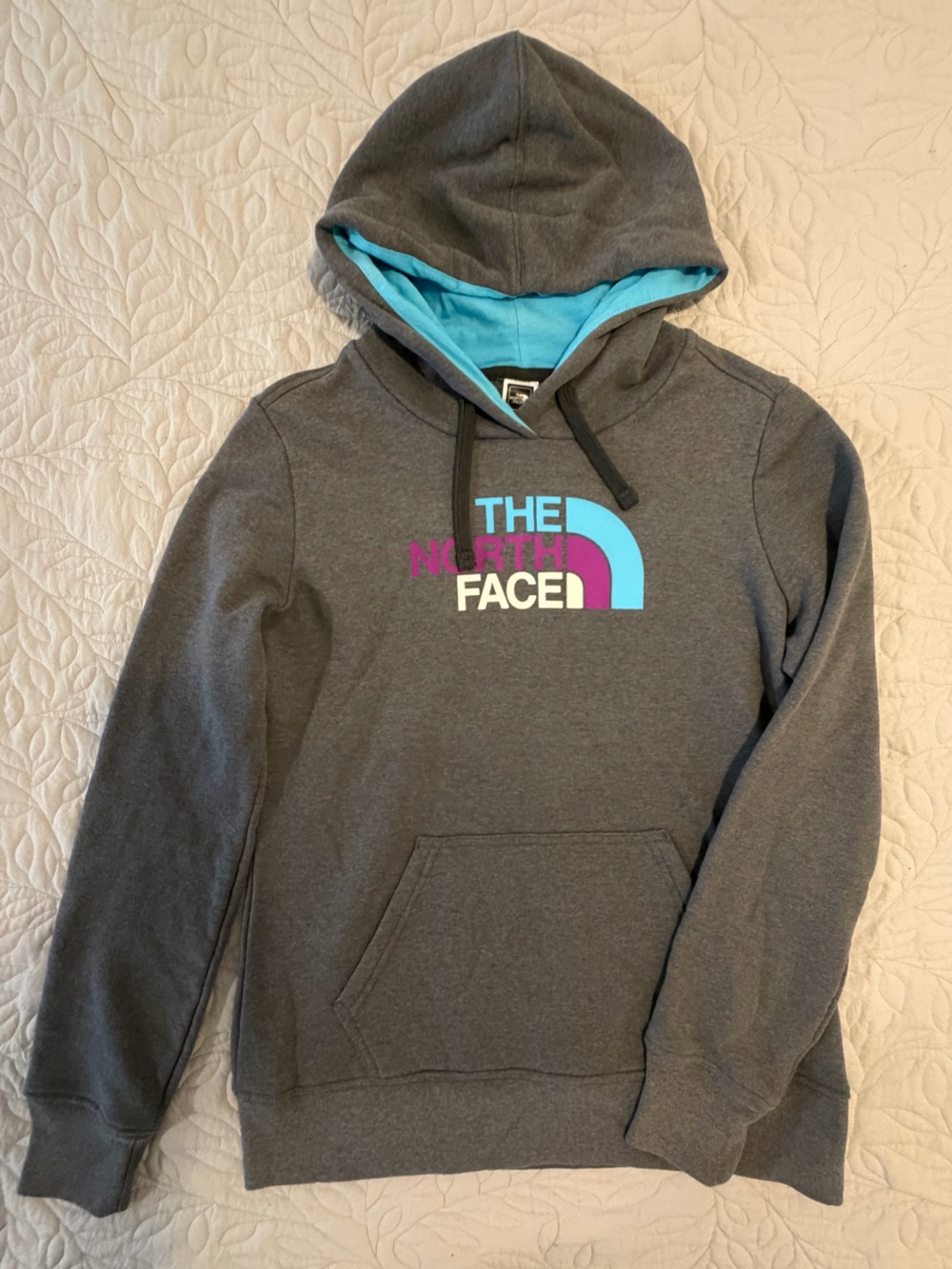 The North Face Women’s Hoodie Grey with Teal Blue Lining and Multicolor Logo